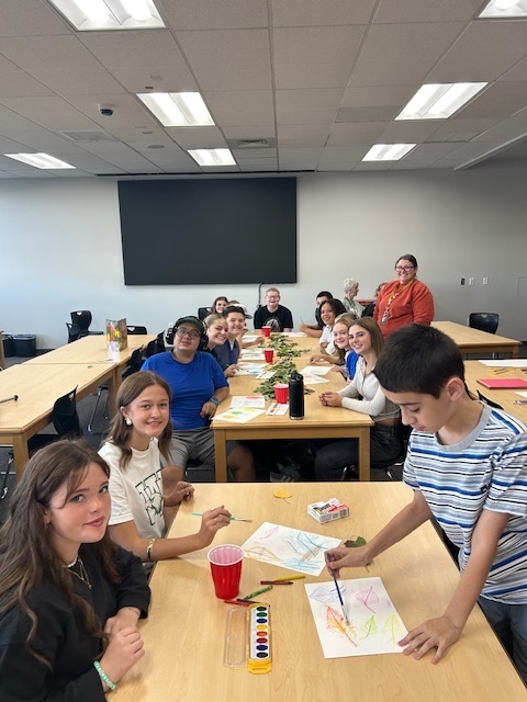 Peer tutors and the Life Skills Students in the media center 