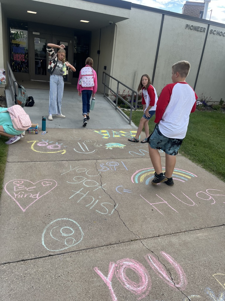 Side walk chalk art with kids around