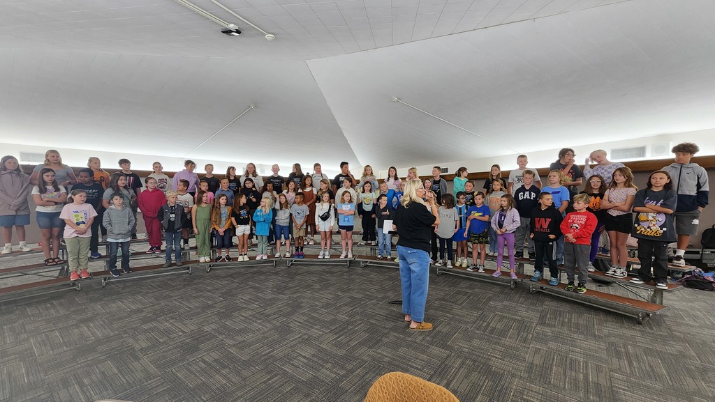 students singing in choirt