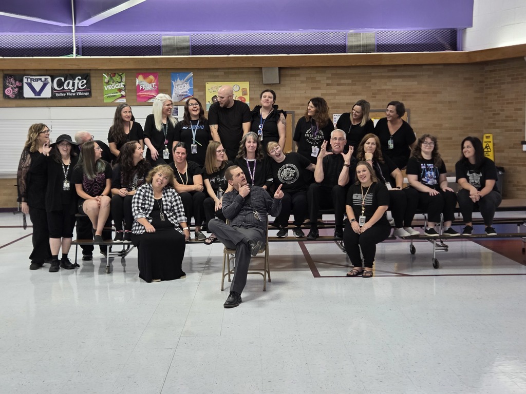 Faculty dressed in all black for underground spirit day.