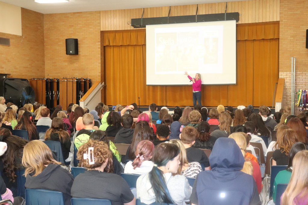 Author McCall Hoyle talking to students