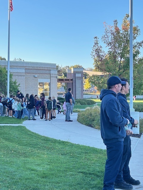 Students walking to school on Walk to School Day for Green Ribbon Week.