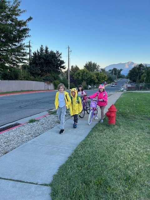 Students walking to school on Walk to School Day for Green Ribbon Week.