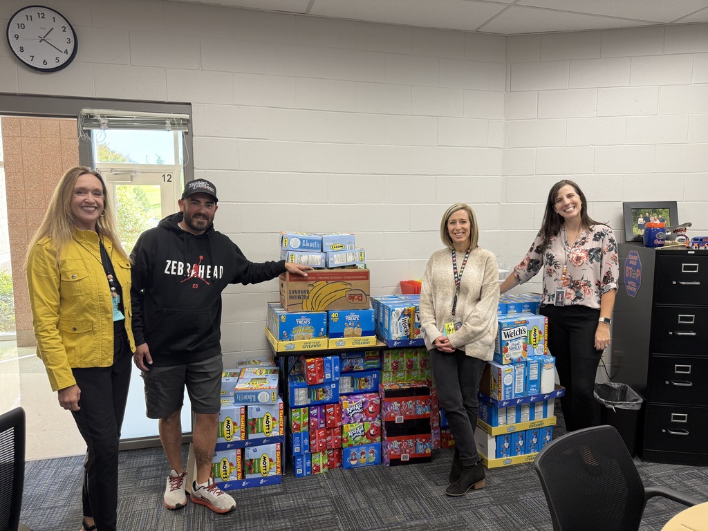 Donation items from Fresh Market in South Ogden with administrative team!