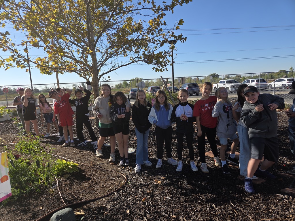 4th graders in the garden