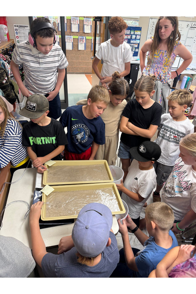 Students learning about erosion