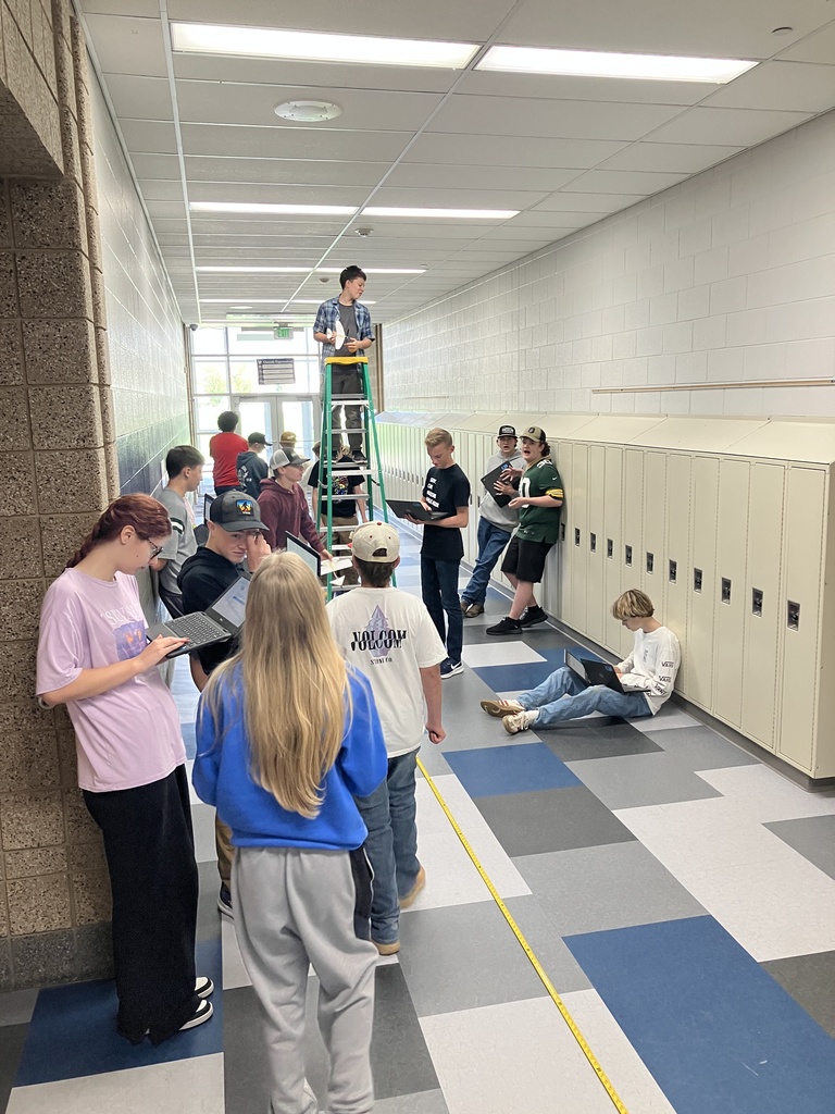 Students spent over a week trying to build a successful rubber-band powered glider that could fly 50ft. As we finished up the unit on Heavier-than-Air travel. In the unit, they were learning about the forces and breakthroughs humankind had to make for this kind of flight to be possible. This is what flight day looked like as they gathered their data.