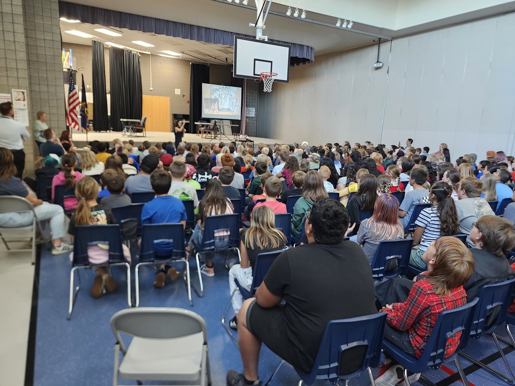 Kids listening to the Author Emily Inouye Huey during an assembly!