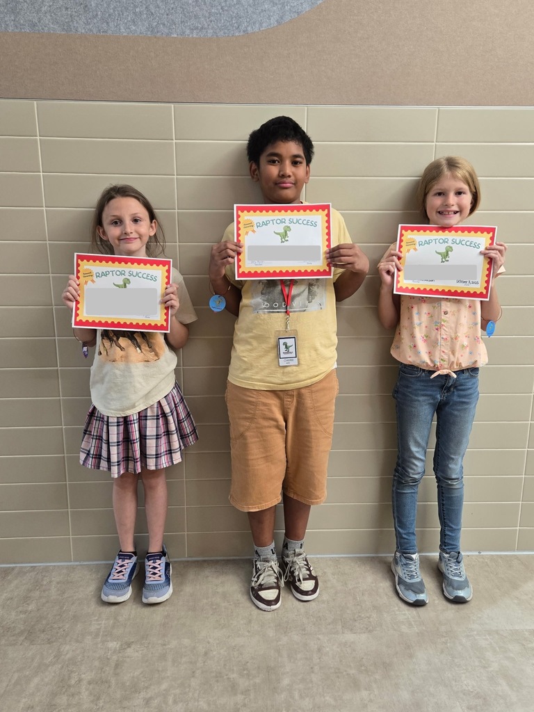 3 students standing with their raptor success awards