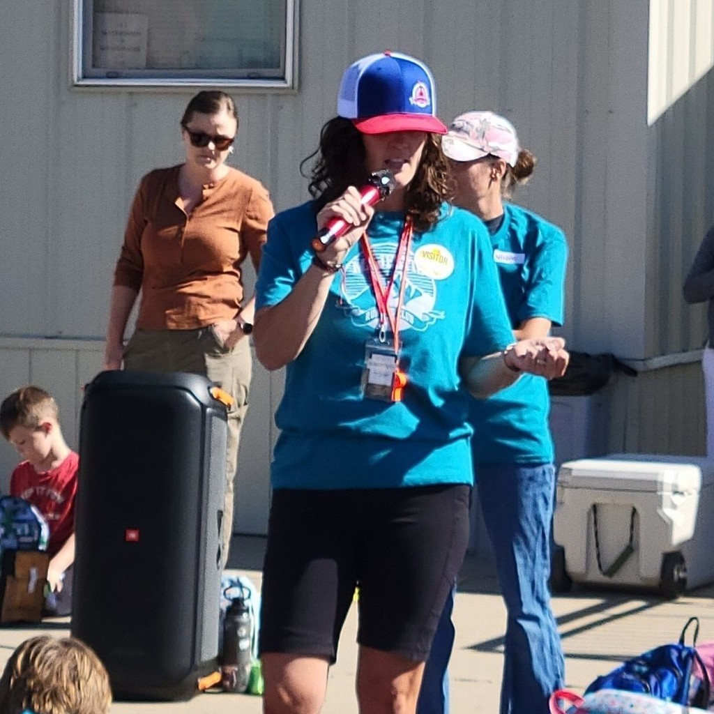 Cristina Watson, the leader of the running club speaking to the kids