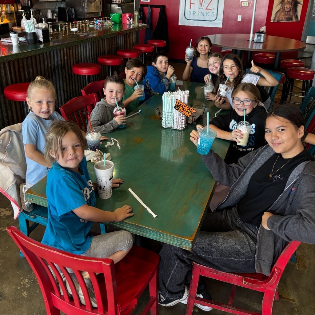 Kids enjoying drinks at Fiz