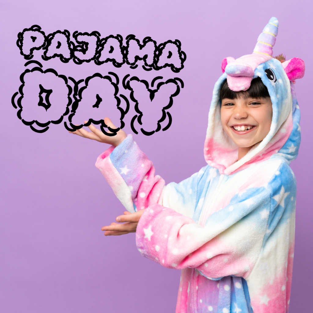 Alt Text Custom Gem Analysis Alternative Text for 'pj day.jpg' A young girl wearing a colorful, pastel blue, pink, and white unicorn onesie with a horn and mane on the hood stands against a solid purple background. She is smiling and presenting to the left with her arms raised, palms open. Above her left arm, the words "PAJAMA DAY" are written in a large, bubbly black font with white outlines.