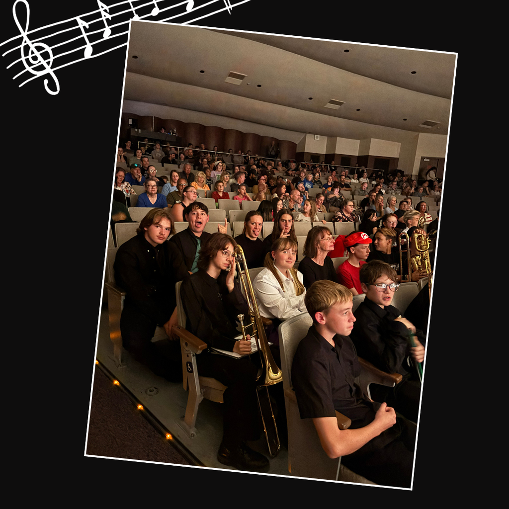 Photos of band playing in their band concert at Roy High Auditorium
