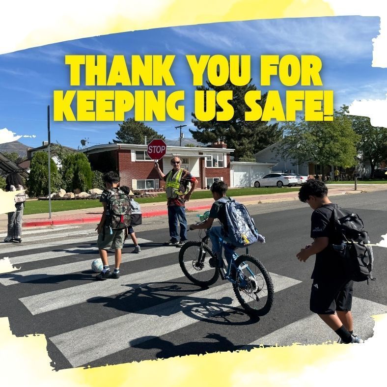 Thank you for keeping us safe. crossing guard helping kids cross