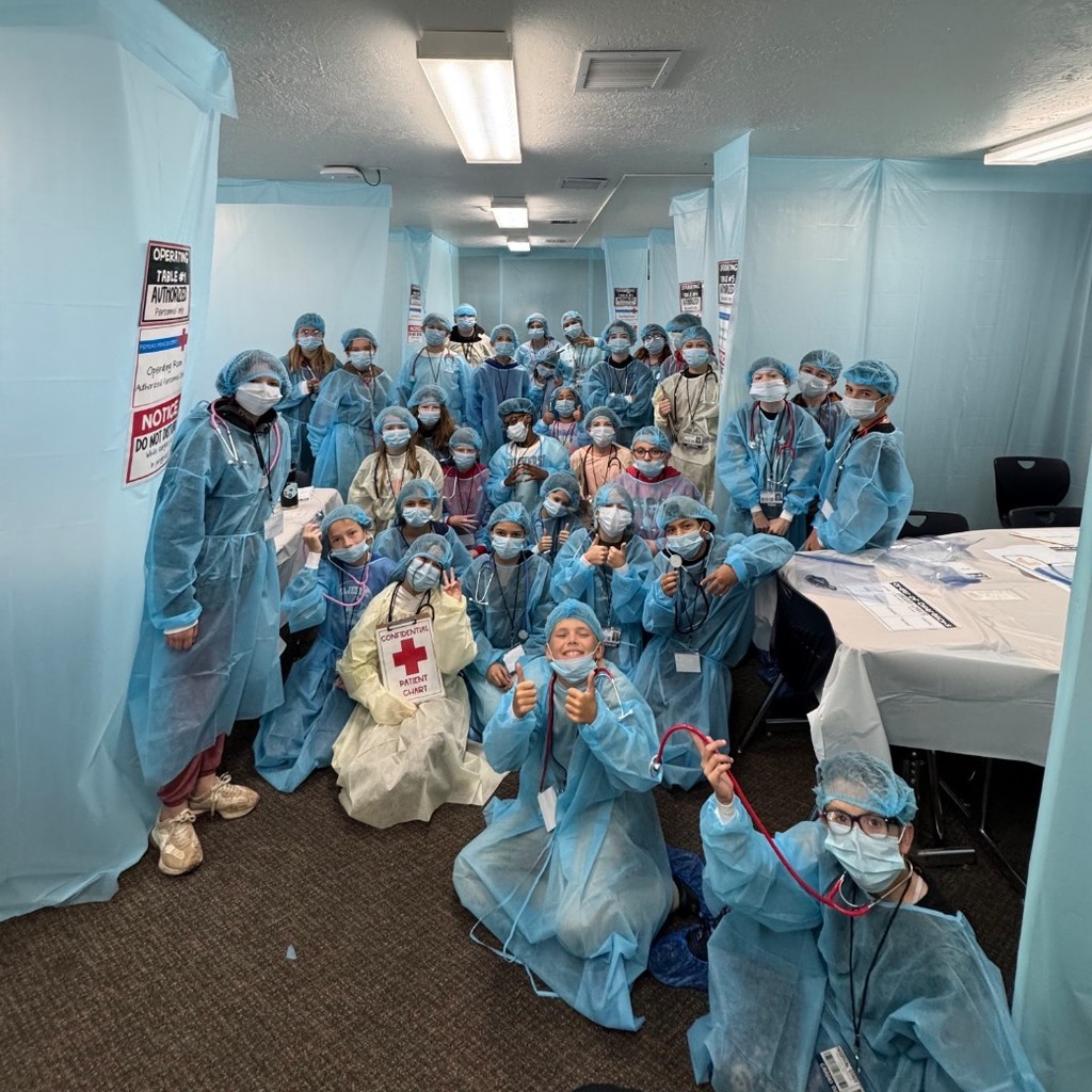 Kids dressed like surgeons