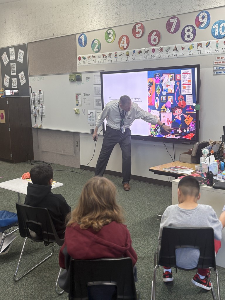 Superintendency reading to the class.