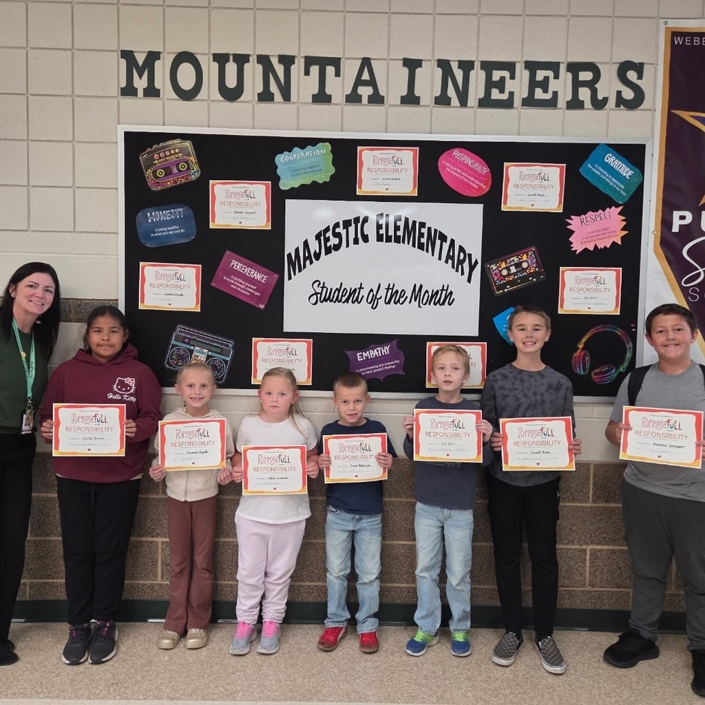 Mrs. Jacobsen with the student of the Month award recipients