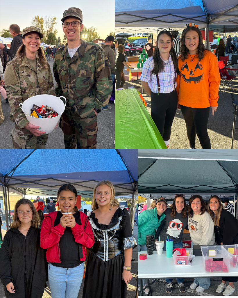 People smiling for the camera at a halloween carnival