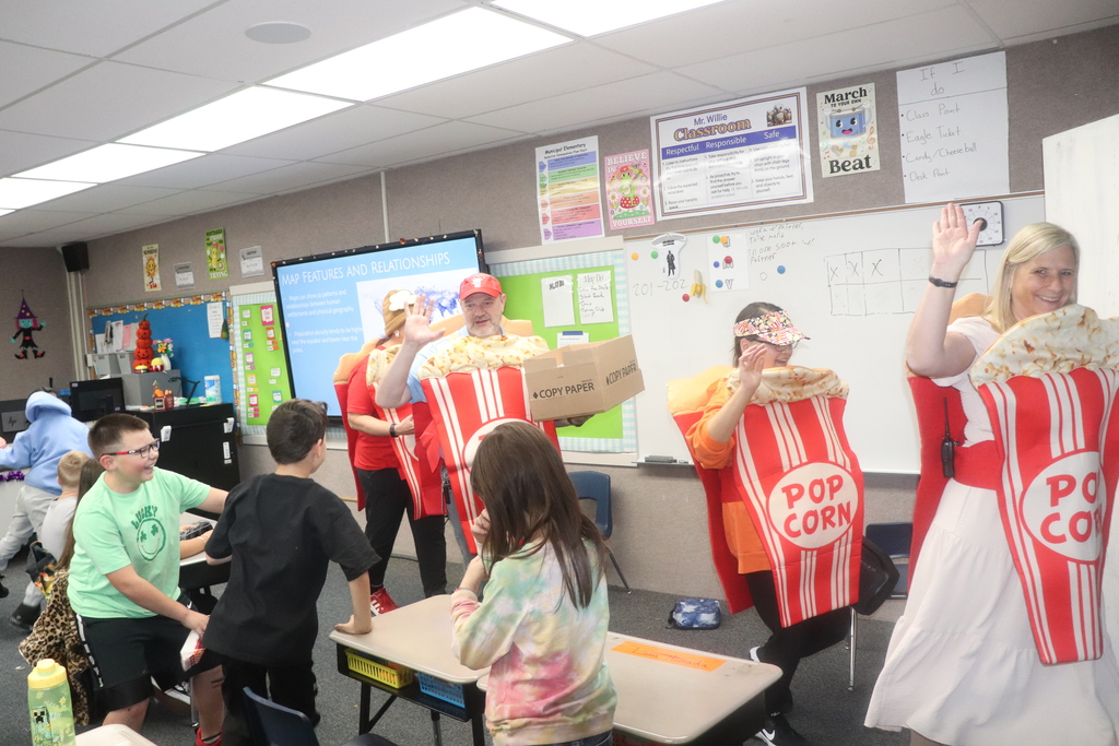 popcorn posse handing out shout outs to students