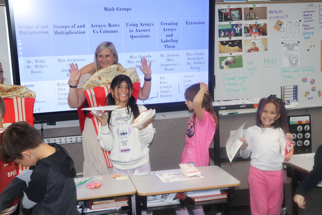 popcorn posse handing out shout outs to students