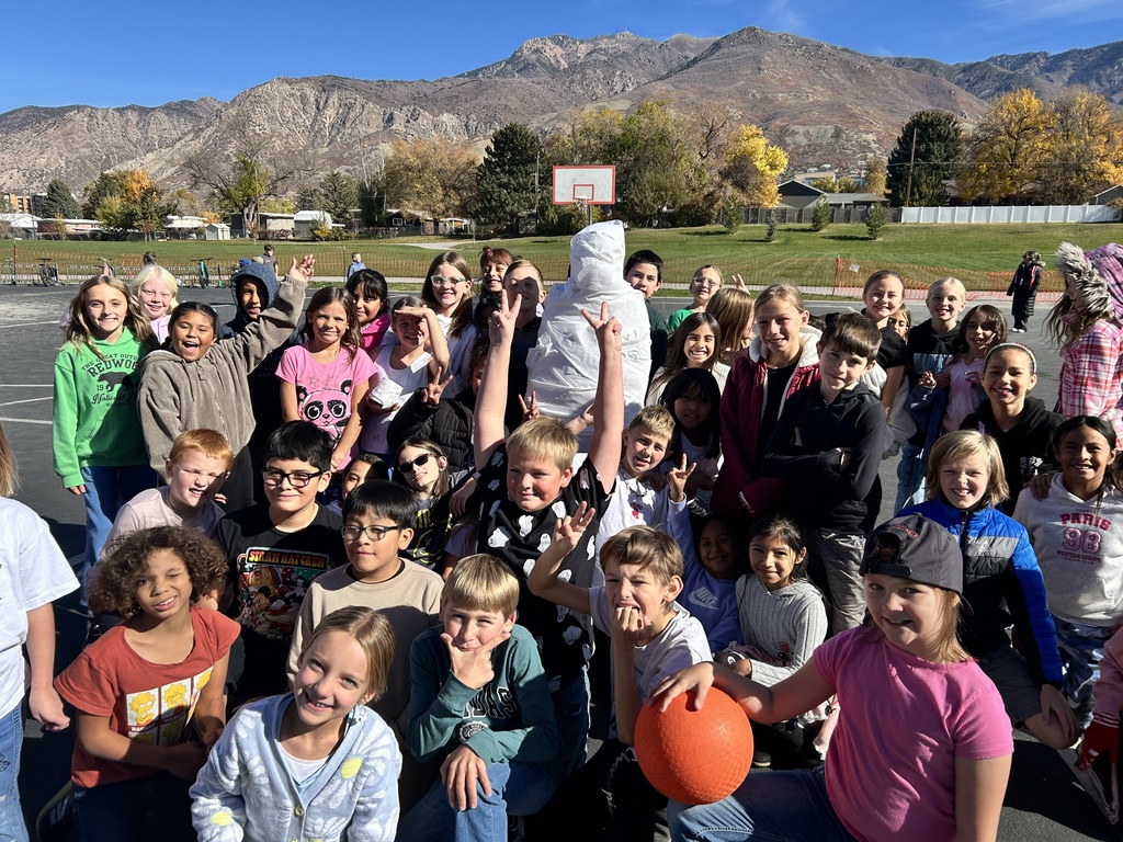 Students participating in the mummy wrap incentive. 