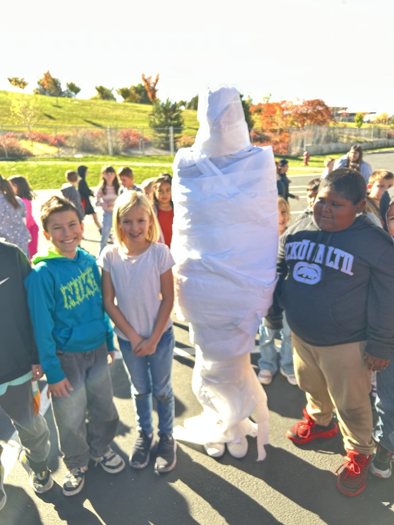 Students participating in the mummy wrap incentive. 