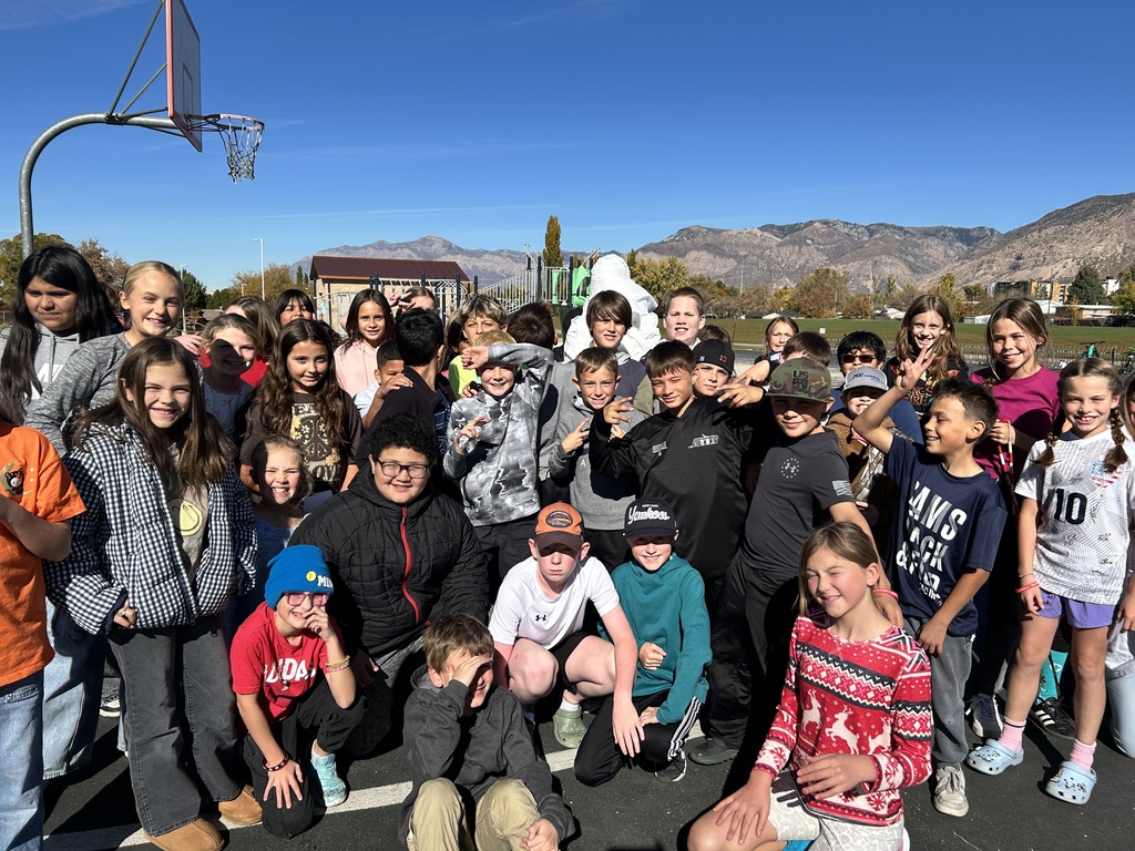 Students participating in the mummy wrap incentive. 