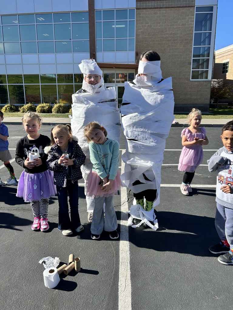 Students participating in the mummy wrap incentive. 