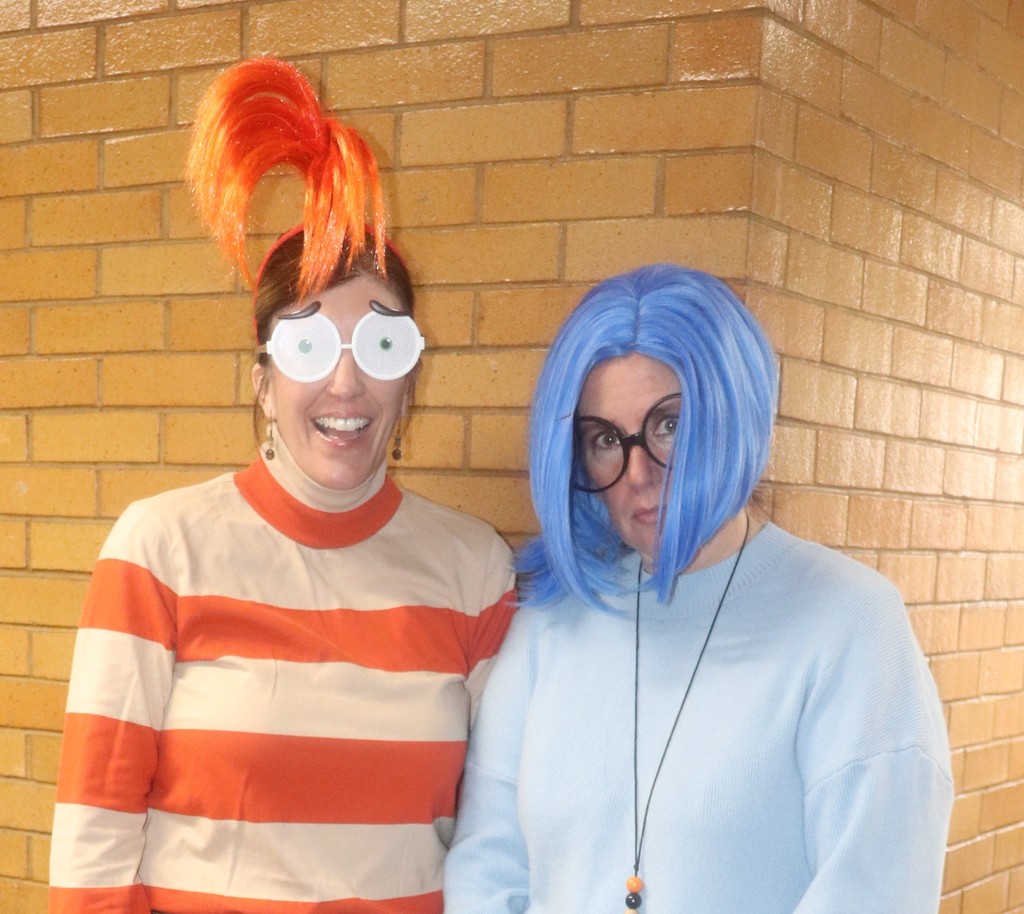 students and faculty at Halloween parade