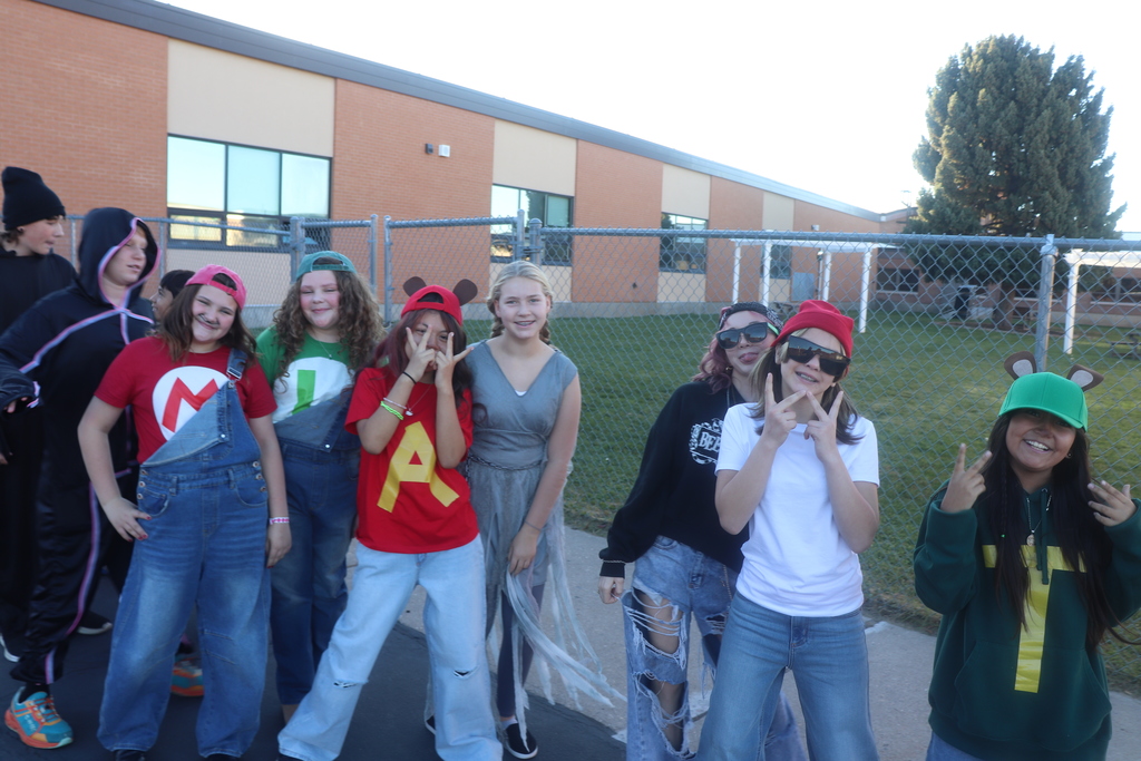 students and faculty at Halloween parade