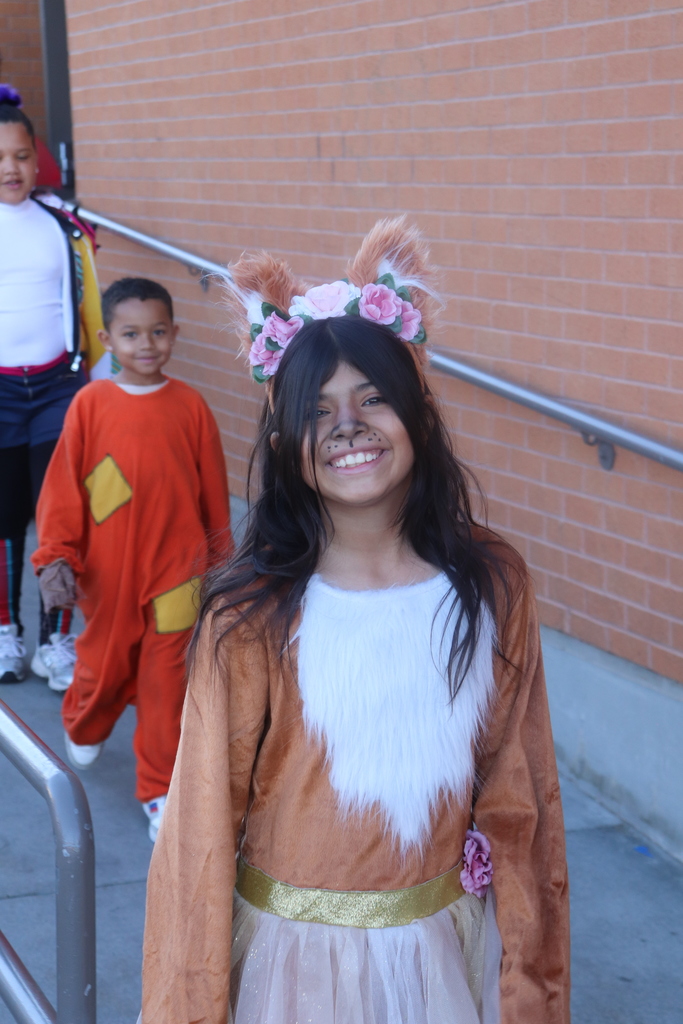 students and faculty at Halloween parade