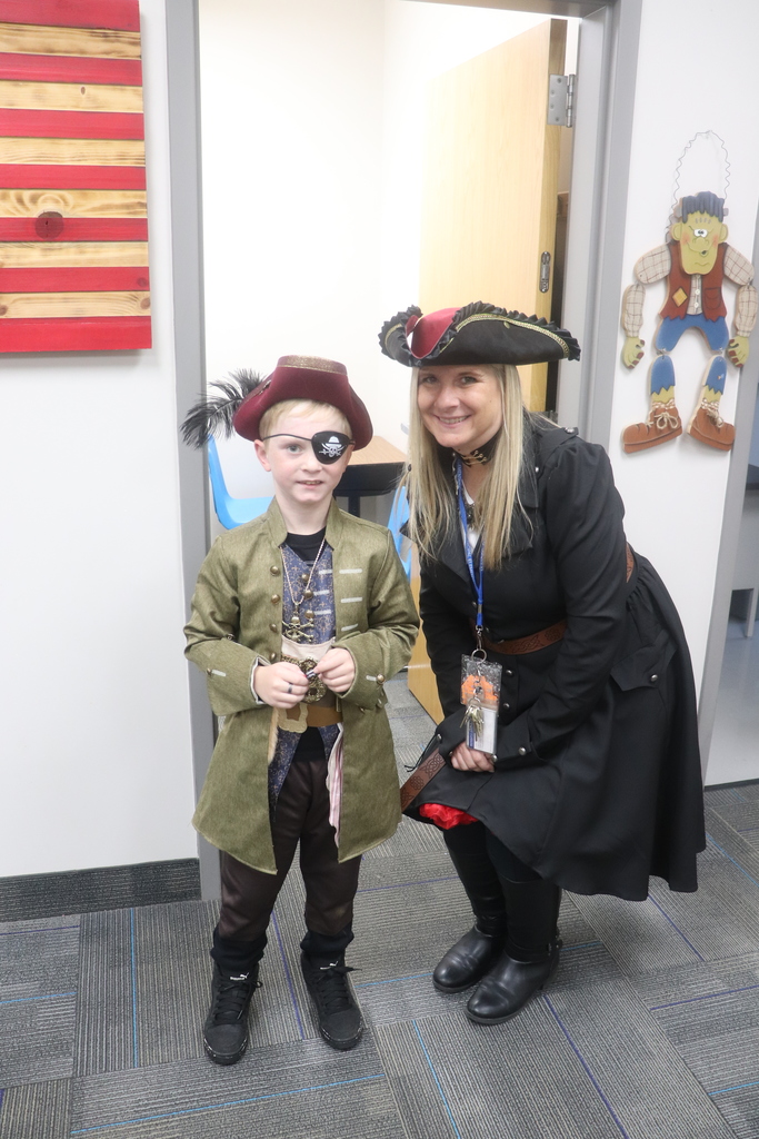 students and faculty at Halloween parade