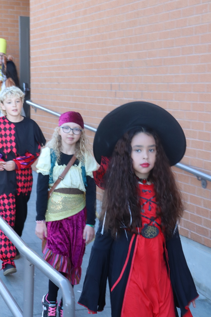 students and faculty at Halloween parade