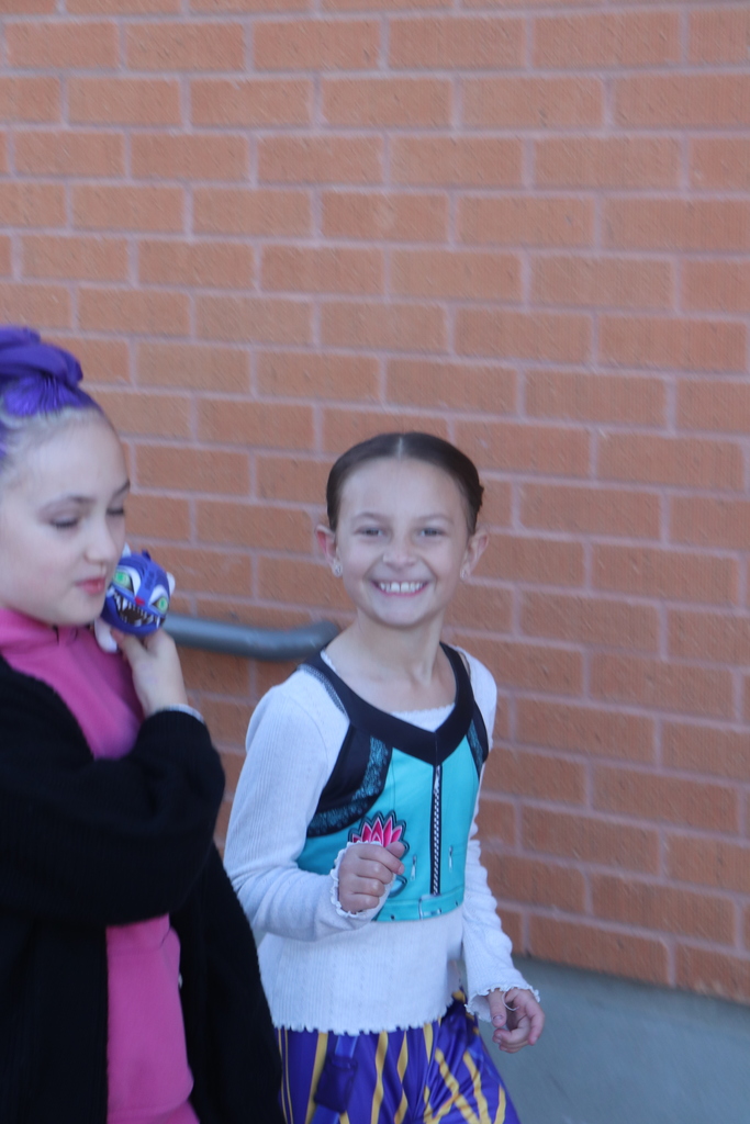 students and faculty at Halloween parade