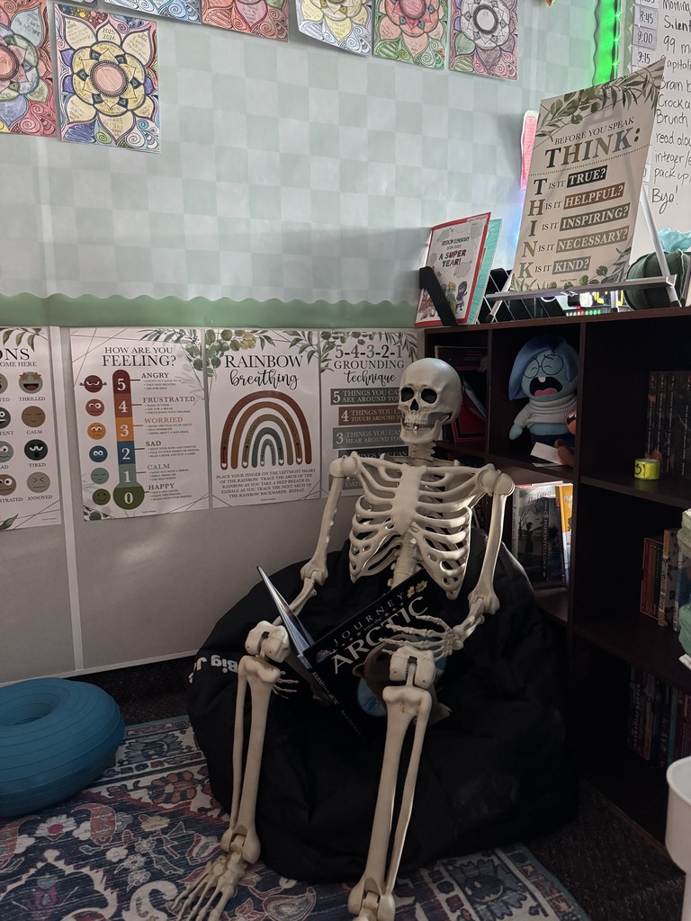 Bob Bones reading in the 6th grade classroom