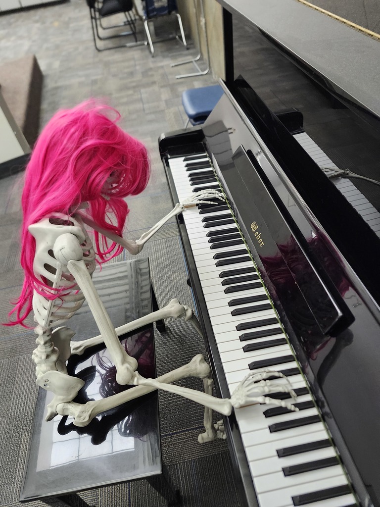 6th grade  Skelly skeleton playing the piano