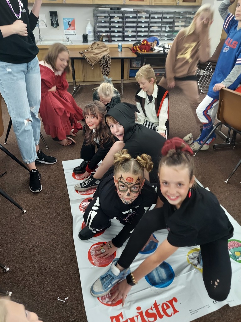Students playing Halloween twister