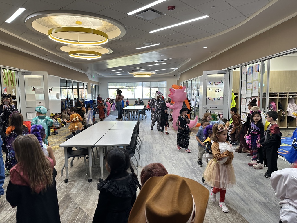 students walking the halloween parade