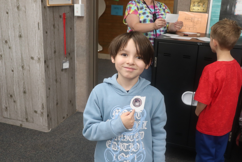 2nd graders going through the voting process