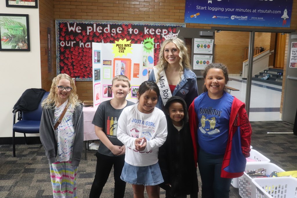students posing for red ribbon week photos , pledging to be drug free