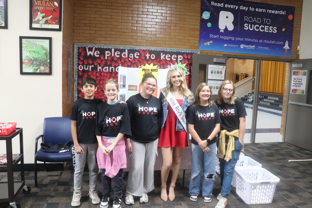 students posing for red ribbon week photos , pledging to be drug free
