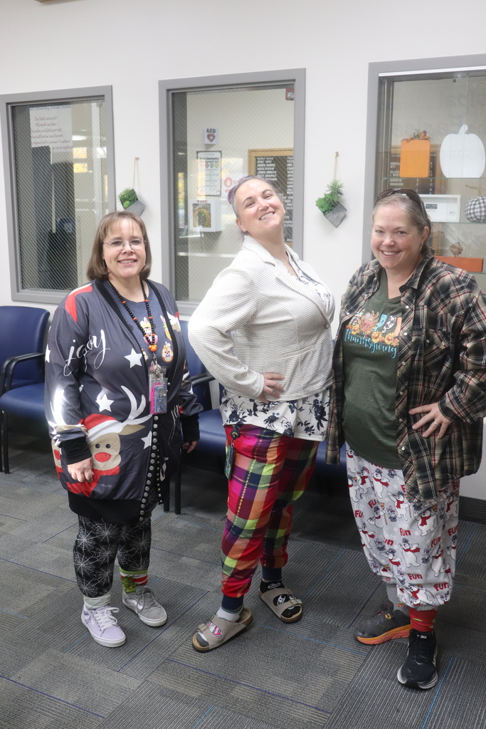 Faculty member supporting red ribbon week by wearing mismatched clothing
