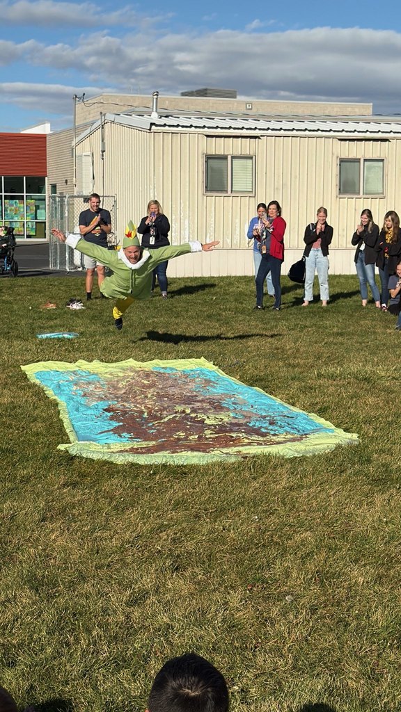 Mr. Lott Taking flight down the pudding Slip N Slide