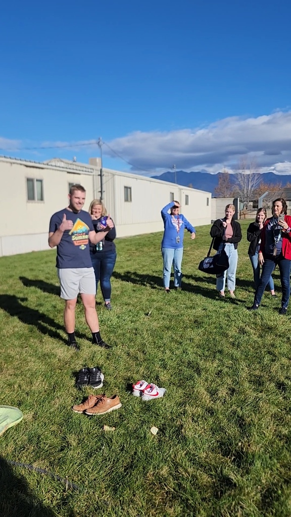 Mr. Talbot getting lined up to take the sticky plunge on the pudding Slip N Slide