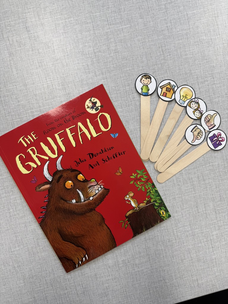 The book "The Gruffalo" and students prompts to help them retell the story