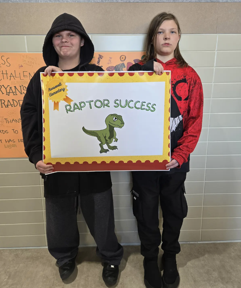 students holding a certificate for the awards they received