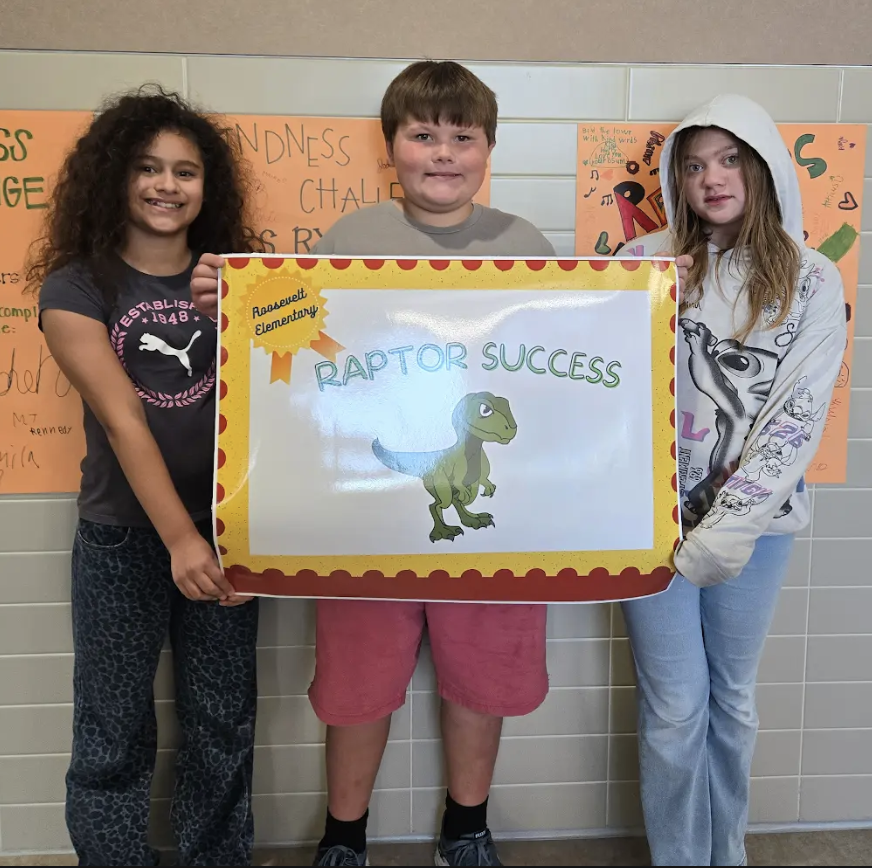students holding a certificate for the awards they received