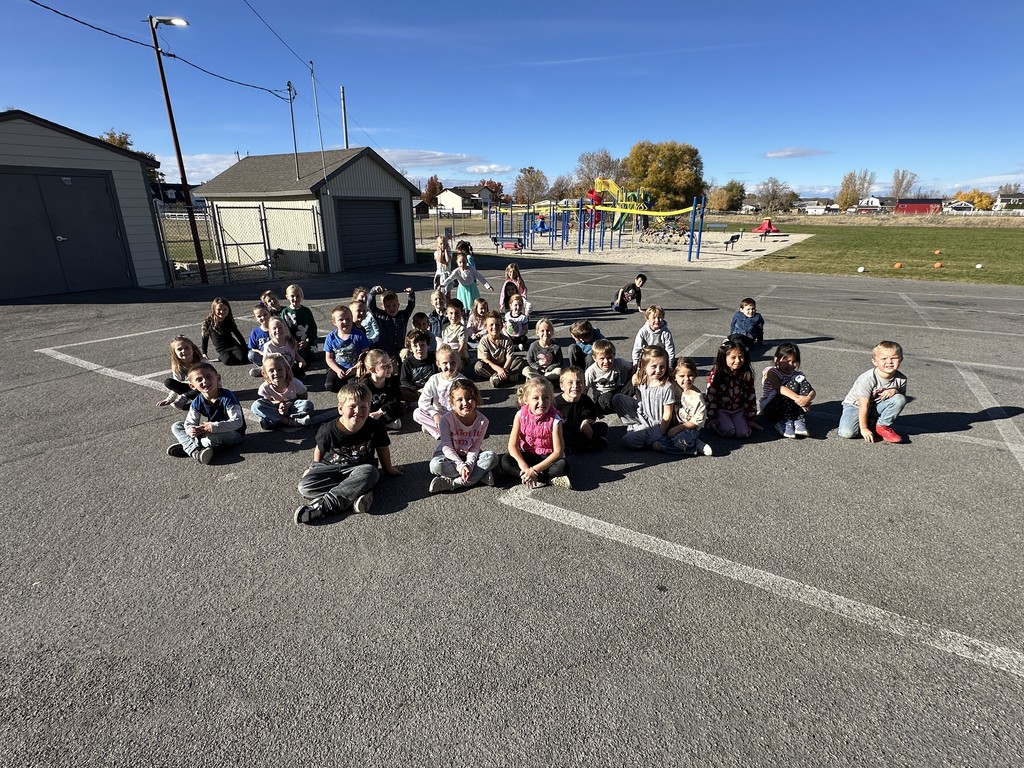 Kindergarten students waiting for the pumpkin drop.