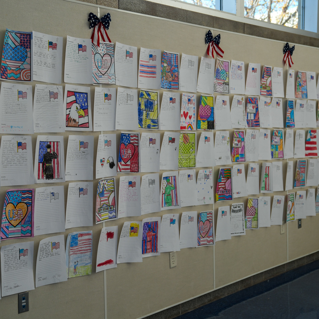 Letters and pictures the students made for the visiting veterans.