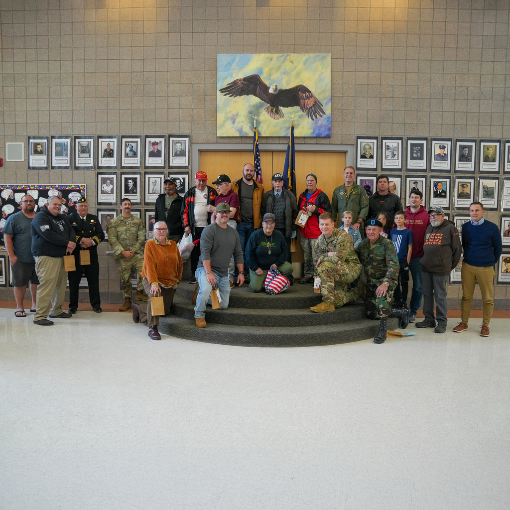 Picture of veterans and active service members who visited our school. 